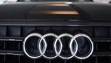Эмблема Audi. Архивное фото Эмблема Audi. Архивное фото