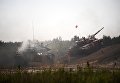 Танки команд Сирии и Таджикистана в индивидуальной гонке международных соревнований Танковый биатлон-2018 на подмосковном полигоне Алабино. Танки команд Сирии и Таджикистана в индивидуальной гонке международных соревнований Танковый биатлон-2018 на подмосковном полигоне Алабино.