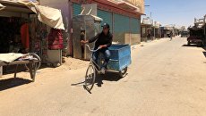 В лагере Сирийских Беженцев Заатари на севере Иордании в провинции Аль-Мафрак. Архивное фото В лагере Сирийских Беженцев Заатари на севере Иордании в провинции Аль-Мафрак. Архивное фото