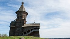 Церковь Успения Пресвятой Богородицы в Республике Карелия. Архивное фото Церковь Успения Пресвятой Богородицы в Республике Карелия. Архивное фото