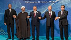 России Владимир Путин на церемонии совместного фотографирования глав государств-участников V Каспийского саммита в Актау. 12 августа 2018 России Владимир Путин на церемонии совместного фотографирования глав государств-участников V Каспийского саммита в Актау. 12 августа 2018