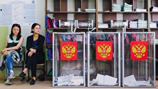 Урны в единый день голосования на избирательном участке Урны в единый день голосования на избирательном участке