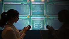 Работа информационного центра ЦИК РФ. Архивное фото Работа информационного центра ЦИК РФ. Архивное фото