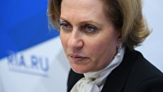 Анна Попова во время интервью на стенде Международного информационного агентства Россия сегодня на IV Восточном экономическом форуме Анна Попова во время интервью на стенде Международного информационного агентства Россия сегодня на IV Восточном экономическом форуме