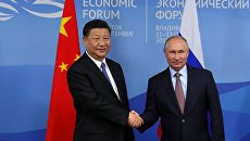 Президент РФ Владимир Путин и председатель КНР Си Цзиньпин Президент РФ Владимир Путин и председатель КНР Си Цзиньпин