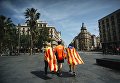Участники акции сторонников независимости Каталонии в Барселоне Участники акции сторонников независимости Каталонии в Барселоне