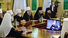 Священнослужители на заседании Священного Синода Русской Православной Церкви. Архивное фото Священнослужители на заседании Священного Синода Русской Православной Церкви. Архивное фото