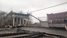 Аварийно-восстановительные работы на месте обрушенного моста в городе Свободном Амурской области Аварийно-восстановительные работы на месте обрушенного моста в городе Свободном Амурской области