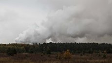 Дым от взрывов на складе с боеприпасами в районе населенного пункта Ичня Черниговской области, Украина. 9 октября 2018 Дым от взрывов на складе с боеприпасами в районе населенного пункта Ичня Черниговской области, Украина. 9 октября 2018