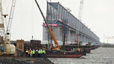 Строительство моста Нижнеленинское – Тунцзян. Архивное фото Строительство моста Нижнеленинское – Тунцзян. Архивное фото