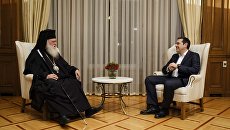 Премьер-министр Греции Алексис Ципрас и архиепископ Афинский и всей Греции Иероним во время встречи. 6 ноября 2018 Премьер-министр Греции Алексис Ципрас и архиепископ Афинский и всей Греции Иероним во время встречи. 6 ноября 2018
