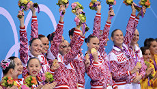 Российская сборная, занявшая первое место в произвольной программе в финале соревнований по синхронному плаванию Российская сборная, занявшая первое место в произвольной программе в финале соревнований по синхронному плаванию