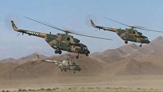 Базу террористов атаковали с вертолетов, окружили танками и взяли штурмом Базу террористов атаковали с вертолетов, окружили танками и взяли штурмом