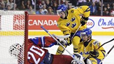 Игровой момент матча Россия - Швеция Игровой момент матча Россия - Швеция