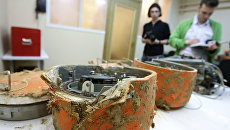 Бортовые самописцы польского самолета Ту-154М, разбившегося 10 апреля под Смоленском. Архивное фото Бортовые самописцы польского самолета Ту-154М, разбившегося 10 апреля под Смоленском. Архивное фото