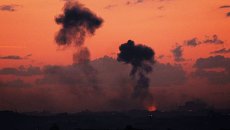 Дым после авиаудара, нанесенного Израилем по Сектору Газа Дым после авиаудара, нанесенного Израилем по Сектору Газа