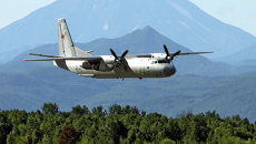 Военно-транспортный самолет Ан-26 в небе над Камчаткой Военно-транспортный самолет Ан-26 в небе над Камчаткой