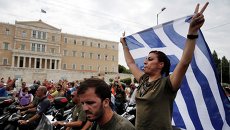 Акция протеста возле здания парламента в Афинах Акция протеста возле здания парламента в Афинах