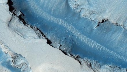 Снимок поверхности Марса, полученный камерой HiRISE Снимок поверхности Марса, полученный камерой HiRISE