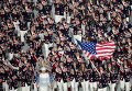 Представители США вышли в костюмах, созданных знаменитым дизайнером Ральфом Лореном. Их делегация – одна из самых многочисленных на Олимпиаде в Сочи. Представители США вышли в костюмах, созданных знаменитым дизайнером Ральфом Лореном. Их делегация – одна из самых многочисленных на Олимпиаде в Сочи.