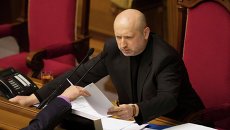 Александр Турчинов во время сессии парламента в Киеве Александр Турчинов во время сессии парламента в Киеве